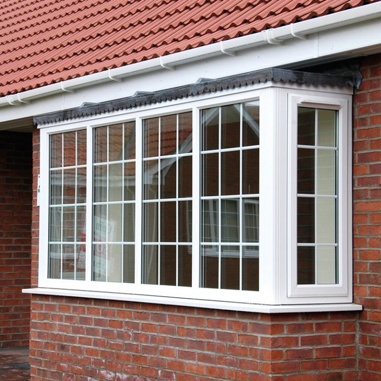 White uPVC bay window with bars bristol