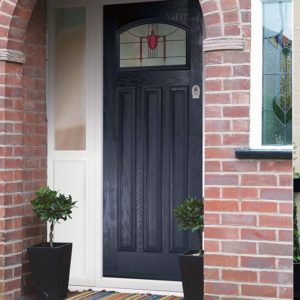Blue composite front door with stained glass detail