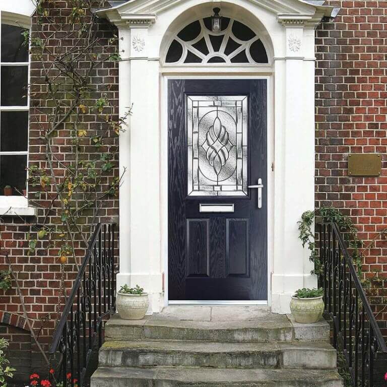 Composite door in blue with decorative glass panel