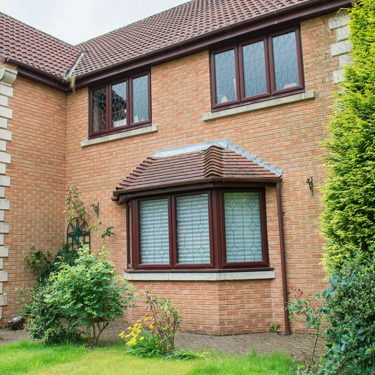 Rosewood uPVC bay window and casement windows
