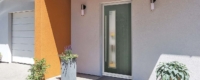 Grey composite front door with woodgrain effect
