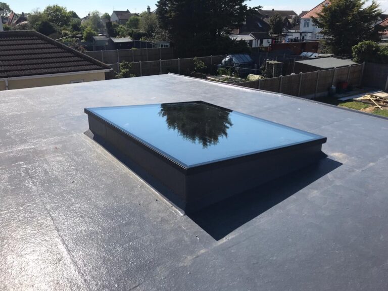 flat angled skylight fitted to flat roof - Associated Windows